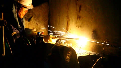 Worker welding at night Stock Footage 22613767