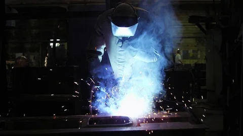 A worker is welding parts Stock Footage 78725448