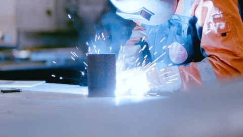 Worker welding a piece of metal - Slowmo - 4K RED Stock Footage 87810280