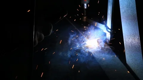 Worker Welding Steel in the Dark Stock Footage 95757642