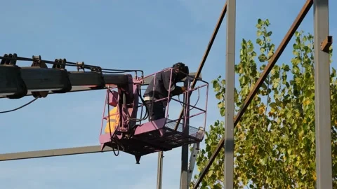 Worker welding, worker welding on crane, in summer Video stock 166160123