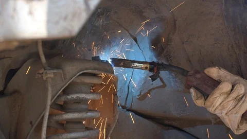 Worker welds the car Stock Footage 93219219