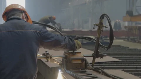 The worker welds the details with welding on the welding machine. Mechanization  Stock Footage 104185033