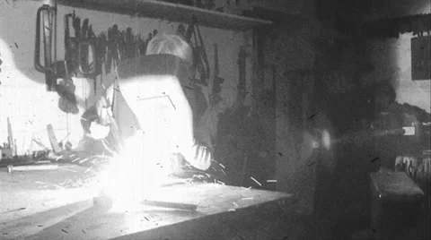 A worker welds - old film effect - black and white 動画素材 39550309