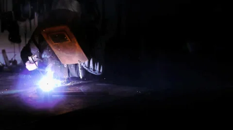 A worker welds in a old Workshop -  mystical atmosphere 動画素材 39549853