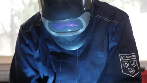 Worker welds a part Stock Footage 285038202