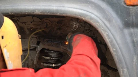 Worker Welds Vehicle Stock Footage 107636130