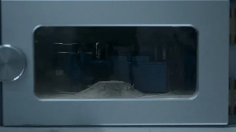 Worker in white gloves open the camera door of the 3d metal printer. Stock Footage 91823865