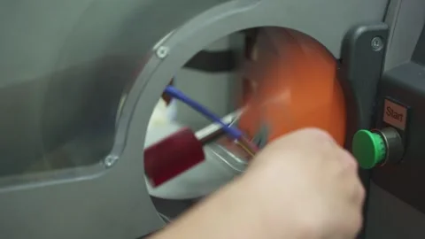 A worker is winding insulating tape around a cable bundle Stock Footage 321897136