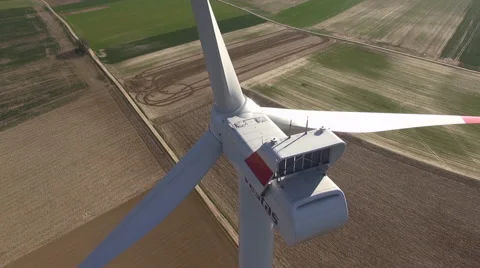 Worker on Windmill - drone flight. 4 Shots in one Stock Footage 40130035
