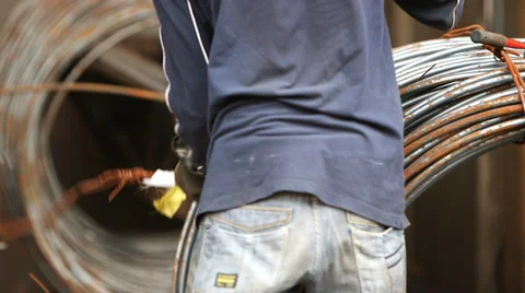 Worker with Wire Rods Stock Footage 34340049