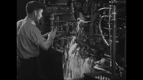 Worker work on lathe machine for metalwork in factory - 1938-1939 Stock Footage 103599891