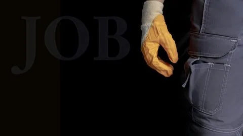 Worker in work pants. Pocket close-up on a dark background. Banner with pla.. Fotos de archivo