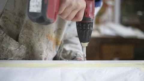 Worker at work, on a wooden window Stock Footage 73729372