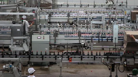 Worker working on assembly line of filling and packaging Shanxi mature vinegar Stock Footage 40776844