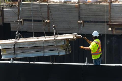 Worker working on a construction site Stock Photos