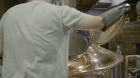 Worker working in distillery Stock Footage 87614516