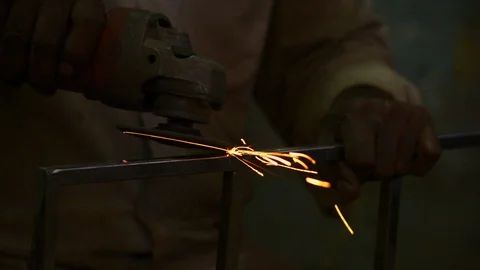 Worker Working With Grinding Tool In The Factory Stock Footage 112767674