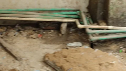 Worker working hard, removing tiles, keeping aside tiles. Stock Footage 245093772