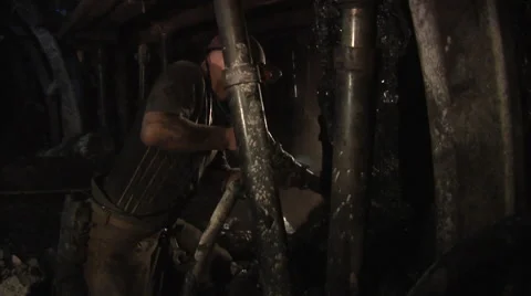 Worker is Working With Jackhammer Darkness Coal Close Up Workers Men in Stock Footage 53504528
