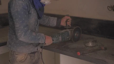 Worker working at a work bench with power tools. Building contractor worker Stock Footage 110771491