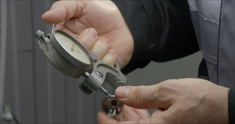 Worker works with precision measuring instruments at metalworking plant Stock-Footage 171569622
