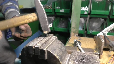 Worker in the workshop makes a rivet. Stock Footage 116208942