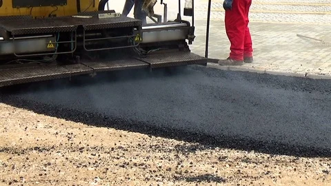 Workers and the asphalting machines Video stock 96826627