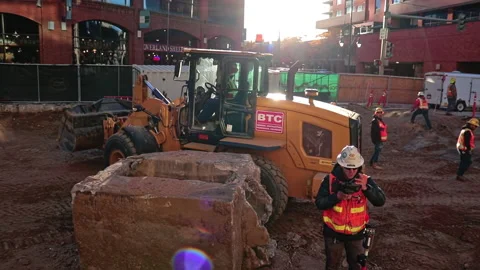 Workers and Dozer Stock Footage 219890934