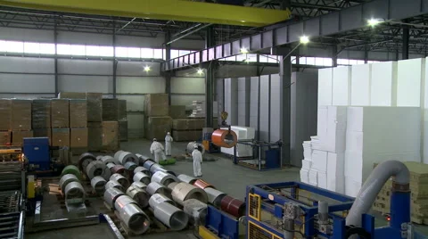 Workers and overhead crane in production hall Stock Footage 67492472