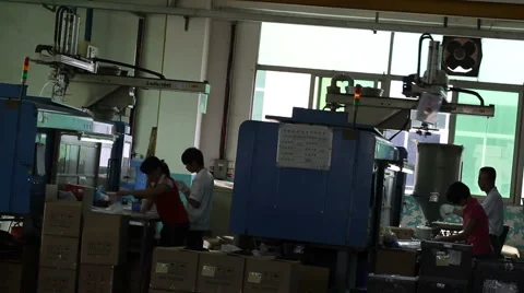 Workers and Robotic Injection Molding Machines Stock Footage 3752196
