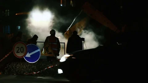 Workers and vehicles during the asphalting of the highway by night 動画素材 73169902