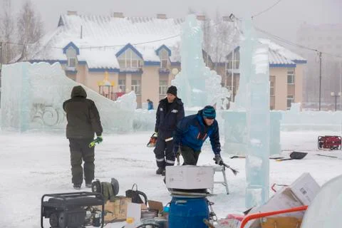 Workers are assembling a power cable for lighting 스톡 사진