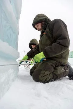 Workers are assembling a power cable for lighting 스톡 사진