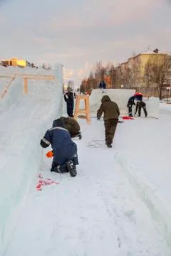 Workers are assembling a power cable for lighting Fotos Stock