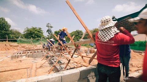 Workers are building a building, concrete mixer, building in Thailand 動画素材 127796825