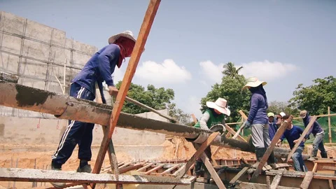 Workers are building a building, concrete mixer, building in Thailand 動画素材 127798986