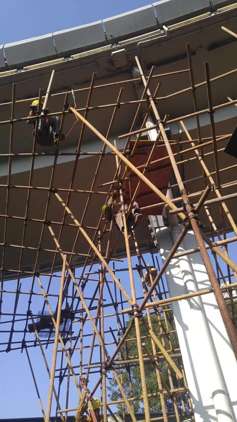 The workers are building the building iron frame Stock Footage 296809903