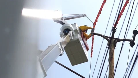 Workers are doing construction maintenance and power lines Stock Footage 231963723