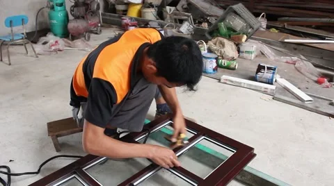 Workers are doing door, aluminum door glass sector Stock Footage 58200237
