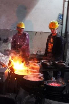 Workers are hard working in a foundry Stock Photos