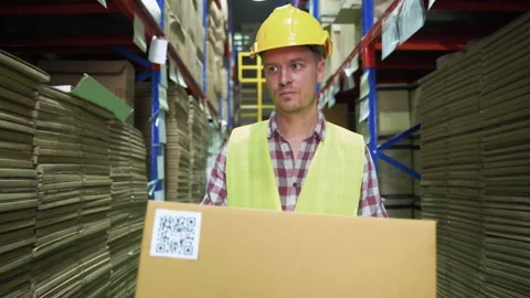 Workers are helping to count and check the inventory in the warehouse. Stock Footage 138113685