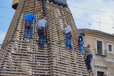 Workers are mounting the figure of the Virgin Mary Stock Photos