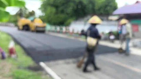 The workers are paving the road Vídeo Stock 335458751