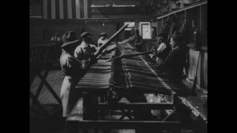 Workers are polishing, labeling and packing rifles 1917 - 1918 Stock Footage 83660797