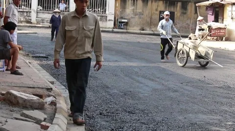 Workers are pouring asphalt Stock Footage 58625981
