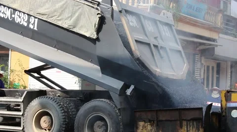 Workers are pouring asphalt Stock Footage 58625993