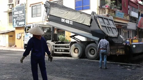 Workers are pouring asphalt Stock Footage 58626050