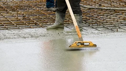 Workers are pouring structural concrete at a construction site Stock Footage 310045209