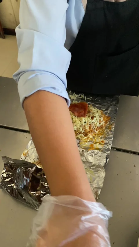 Workers are preparing food called "mie bakar" or roasted noodles Stock Footage 293039572